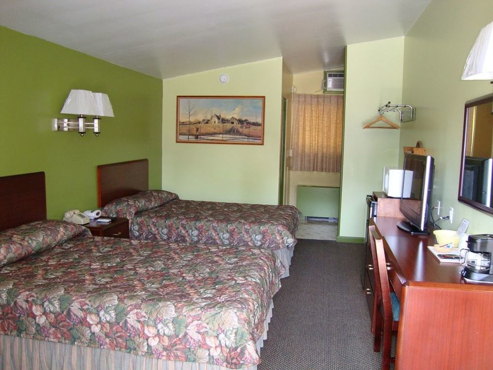 Pinconning Trail Inn Motel Quarto foto
